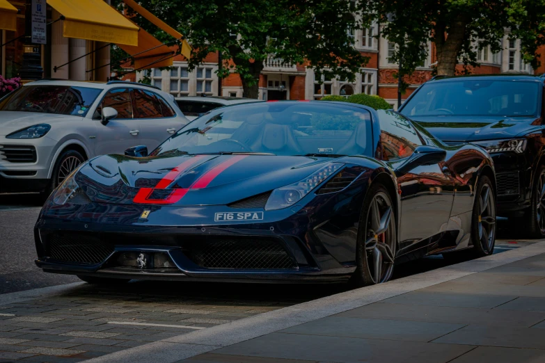 a sports car is driving down a street