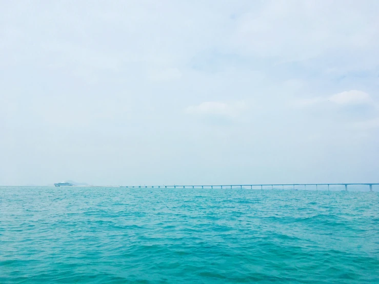 a large bridge spanning the width of the ocean