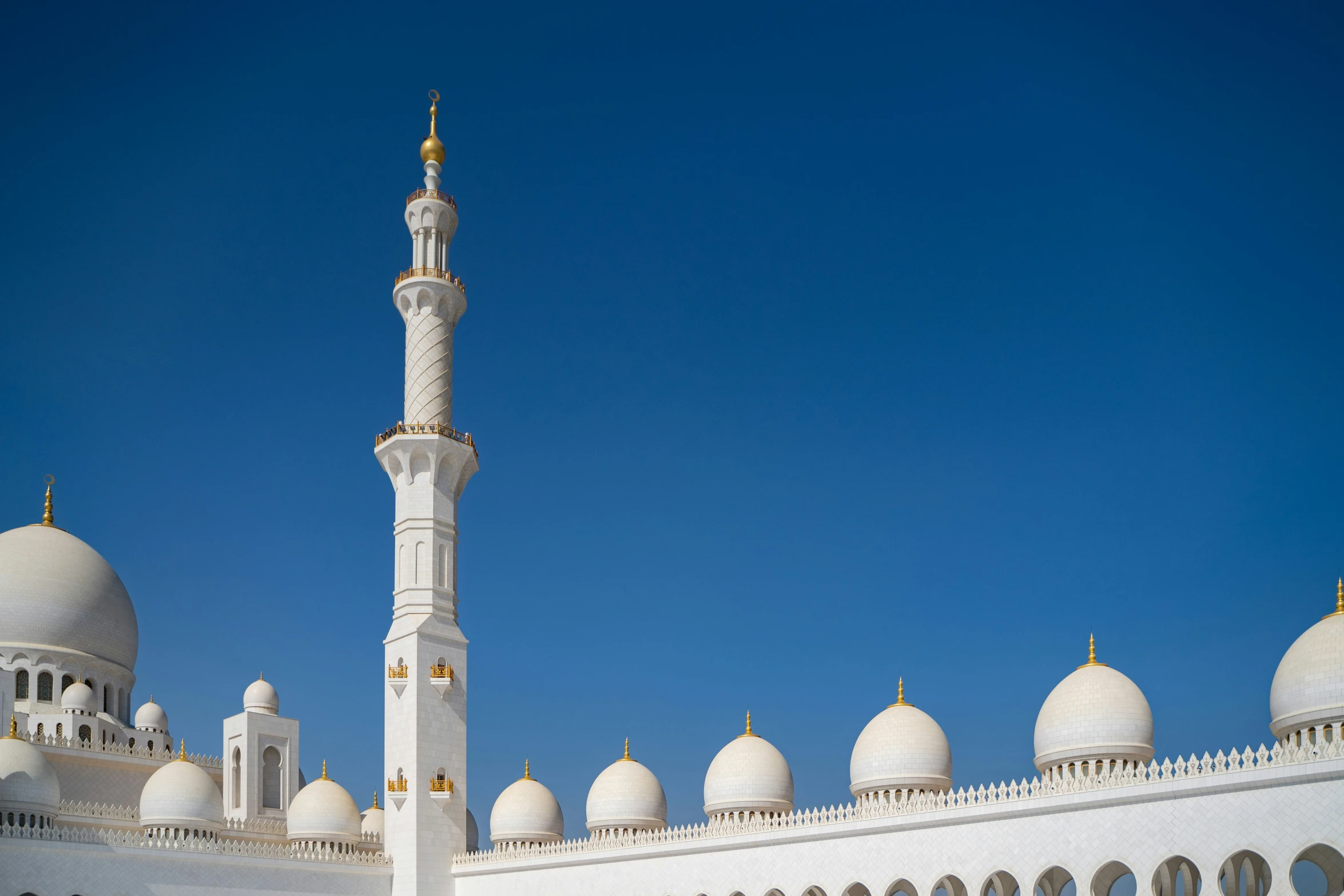 a large white building with a tall dome