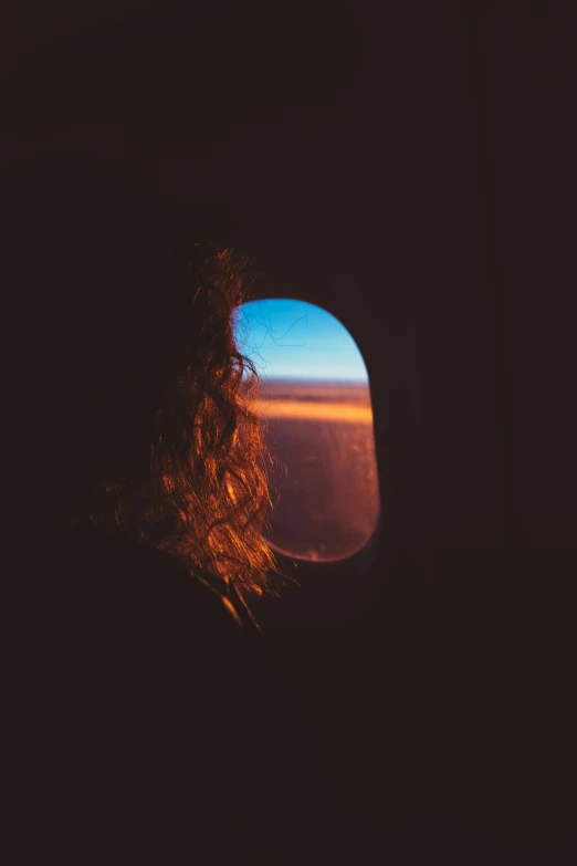 the view out of an airplane window at a wing