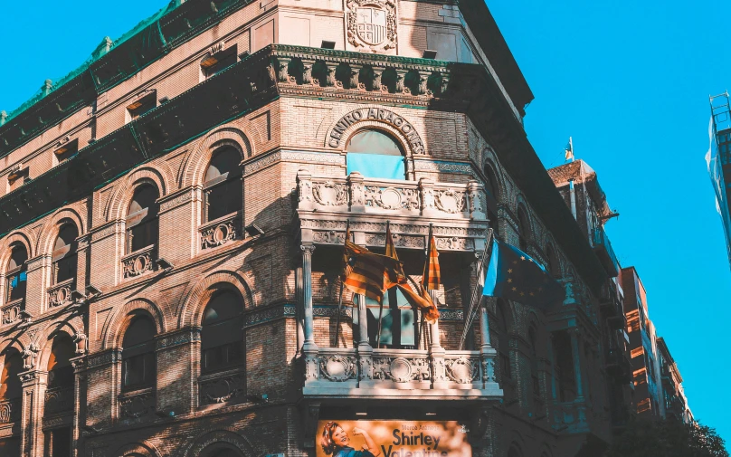 the building is tall with many ornate windows