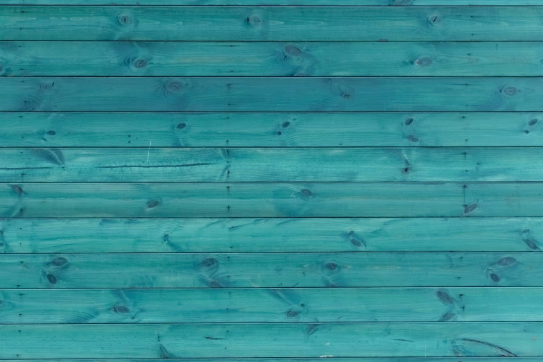 two chairs against a wooden wall on the other side