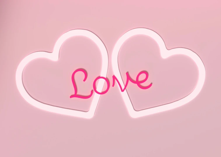 two pink hearts with the word love cut out