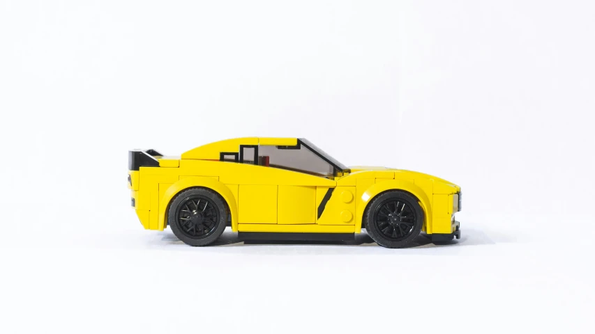 a lego car is shown on a white surface