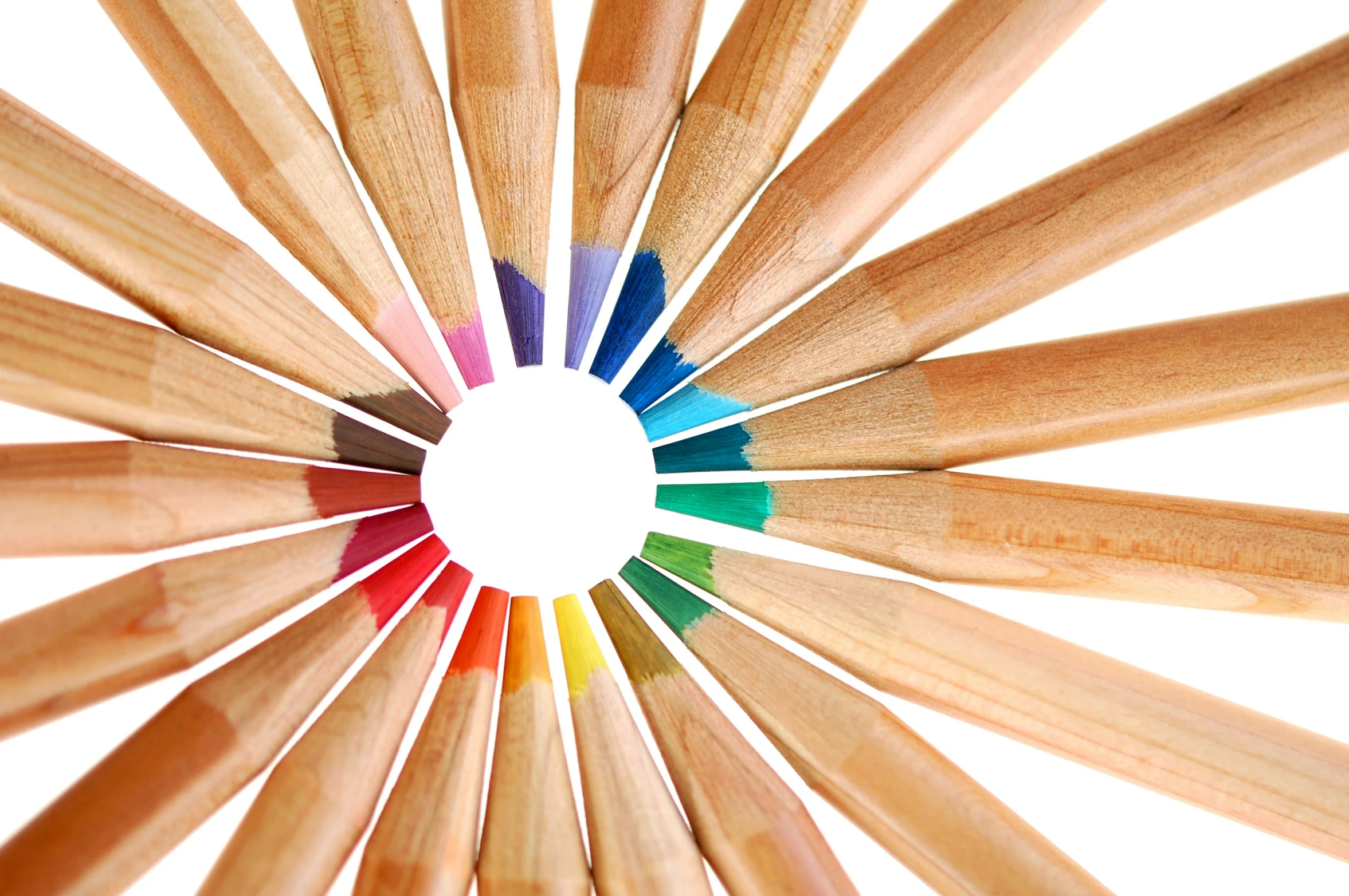 the top view of several wooden pencils with colored ends