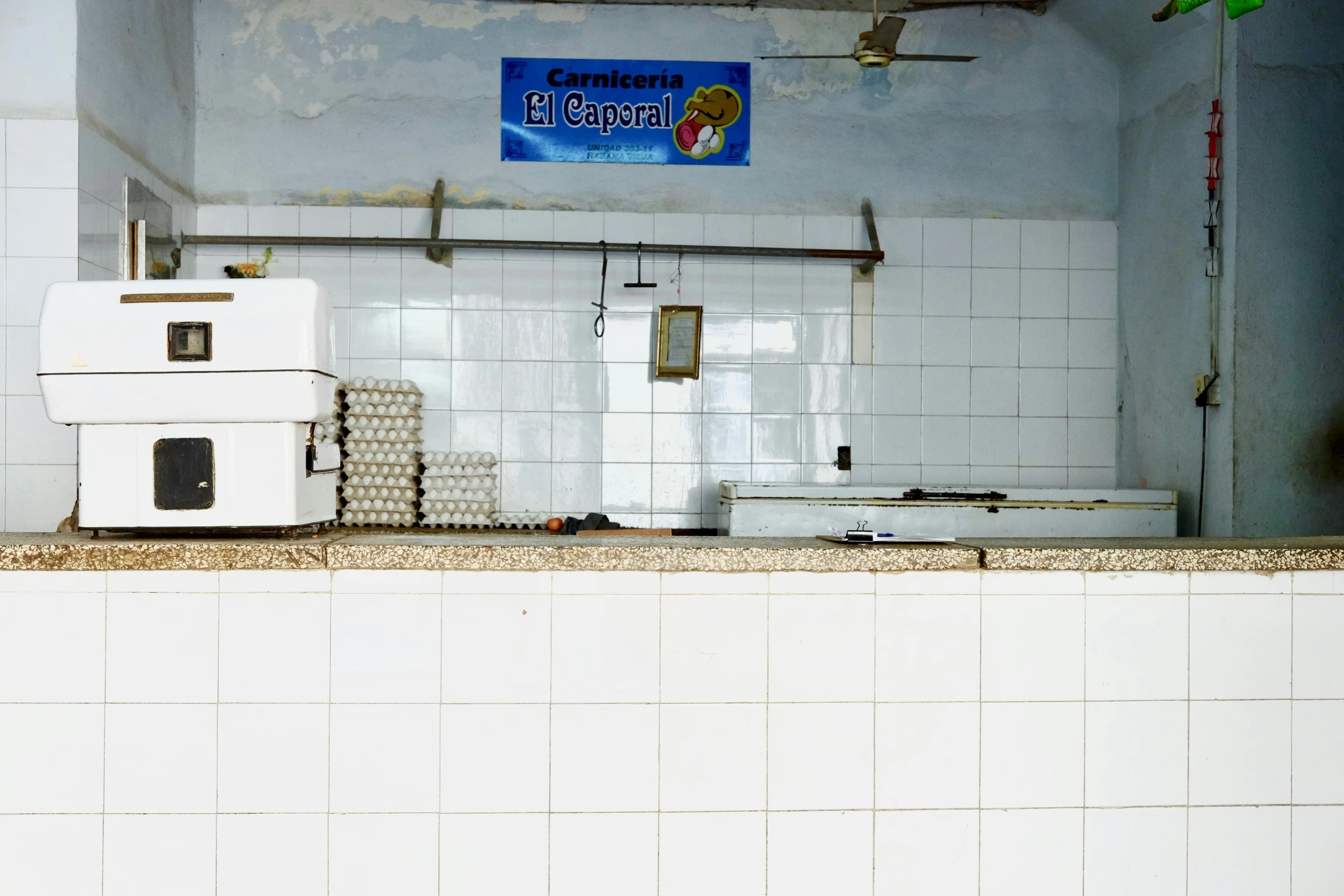 a very dirty commercial kitchen is seen here