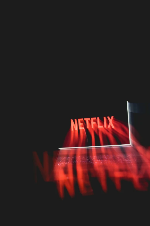 a netflix sign is shown with the background blurry