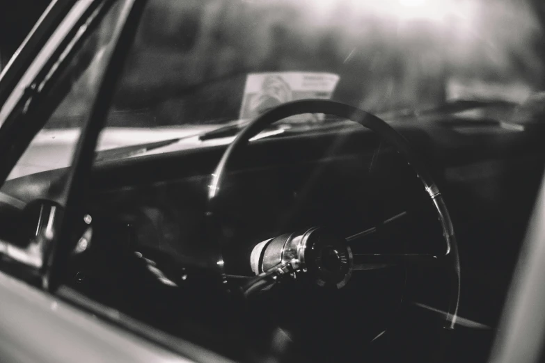 an image of light coming through the windshield of a vehicle