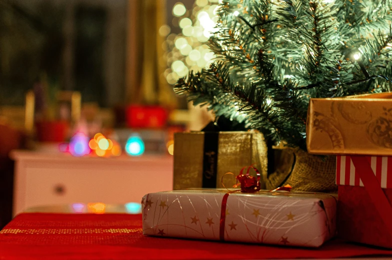 gifts piled under the tree, one for children