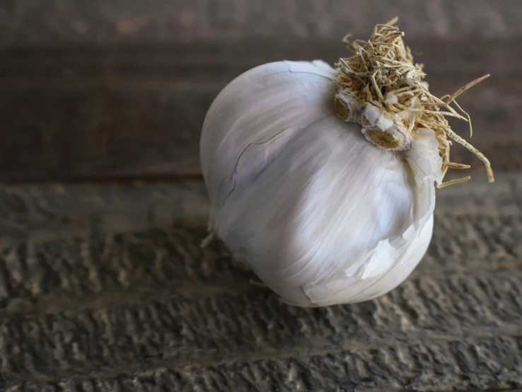 a bulb of garlic has been left on the table