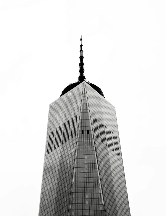 a tall building with many windows on the top