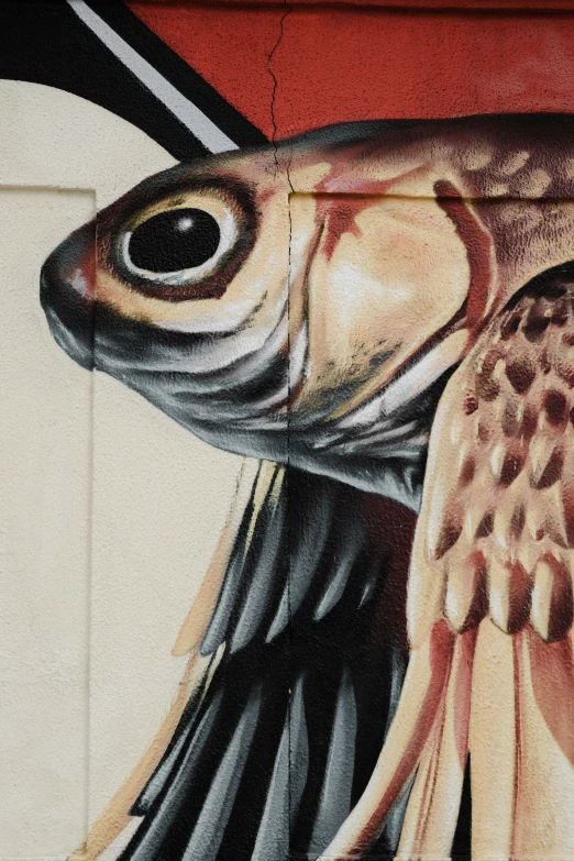 a painting of a fish painted on a wall