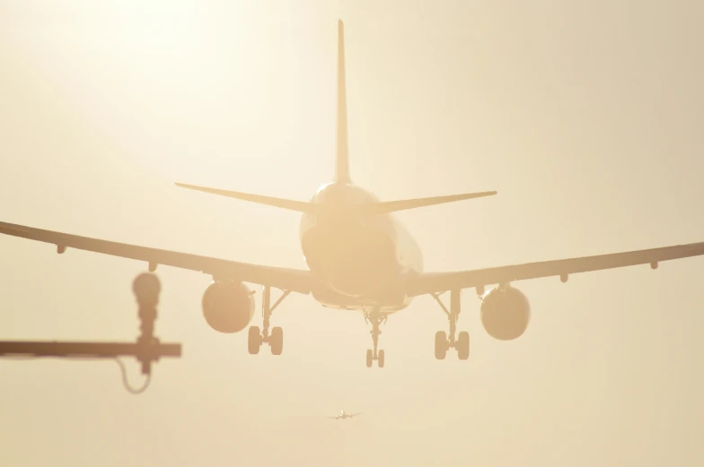 a very large passenger jet that is flying in the sky