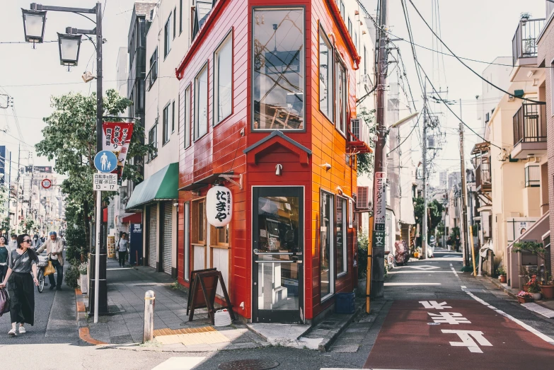 a street scene with a colorful corner building