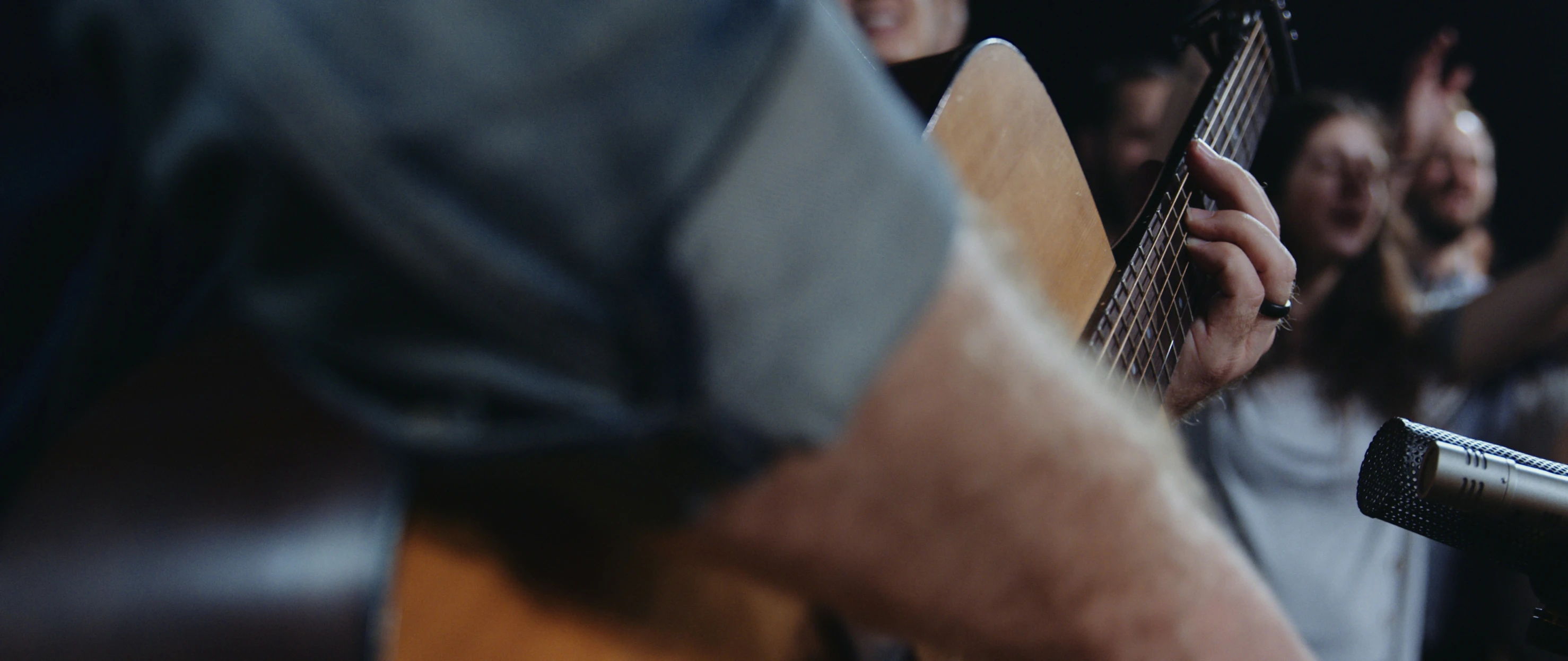 an image of people playing music together