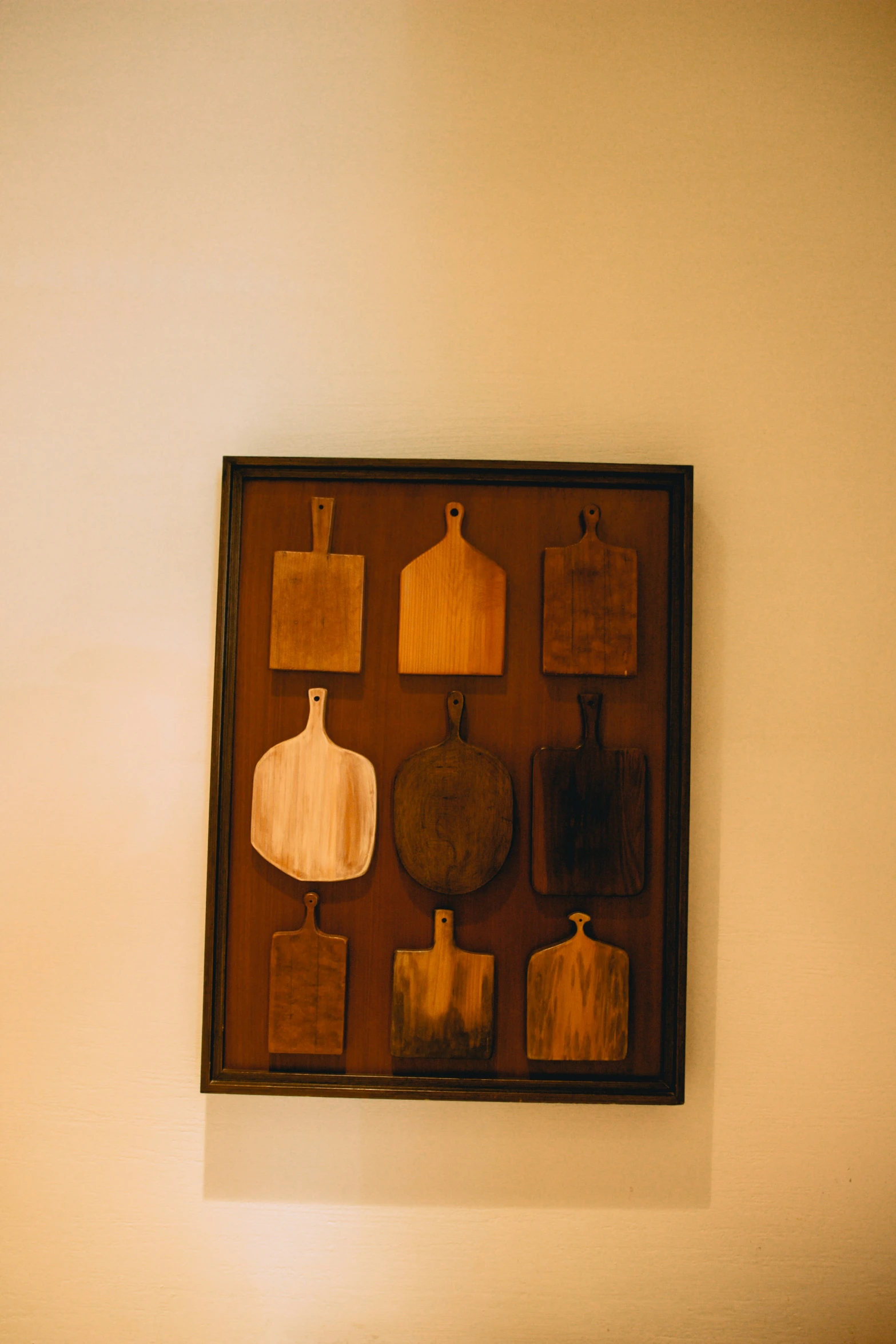 a wooden  board with different shapes on it