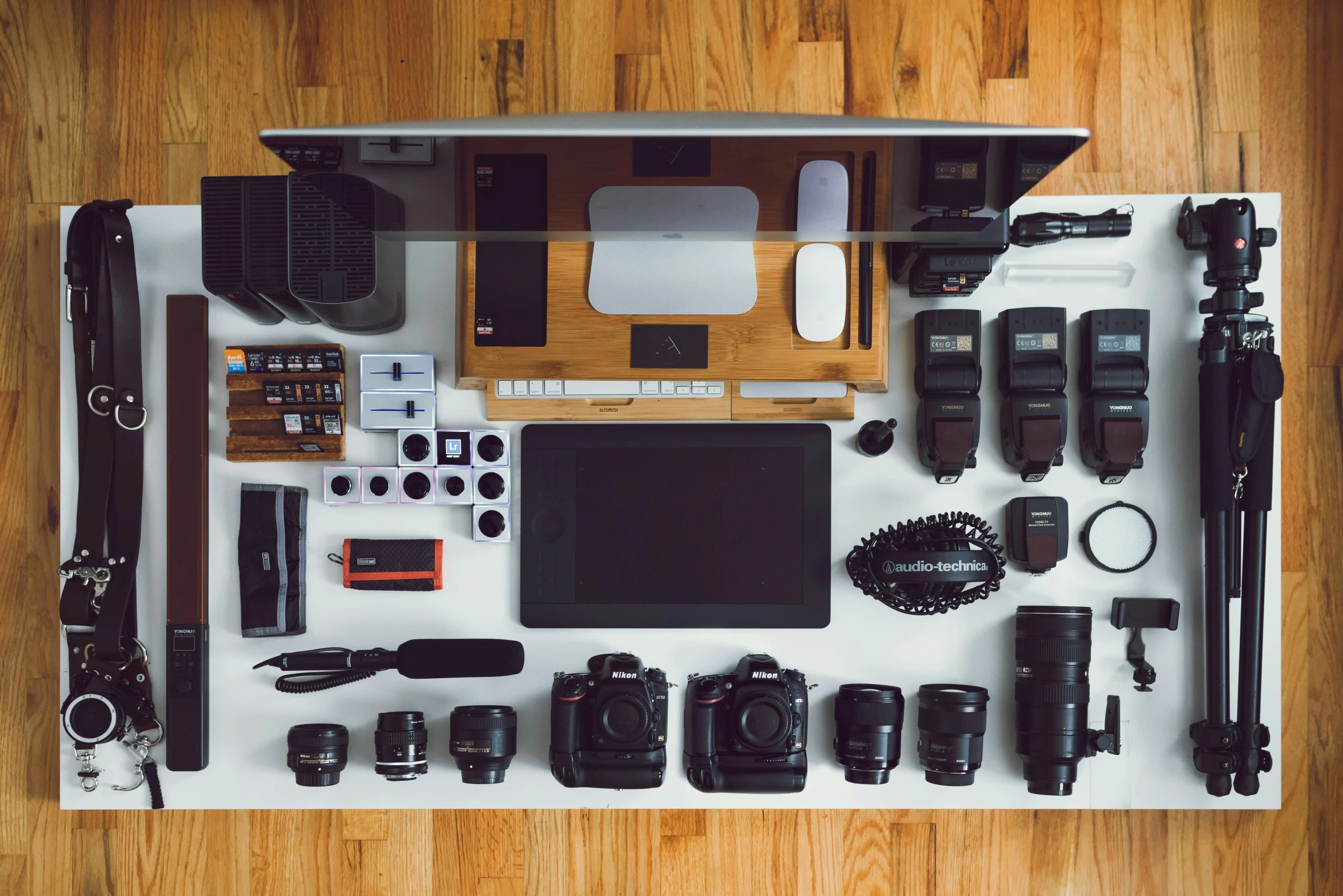 a set of cameras and cameras on top of a table