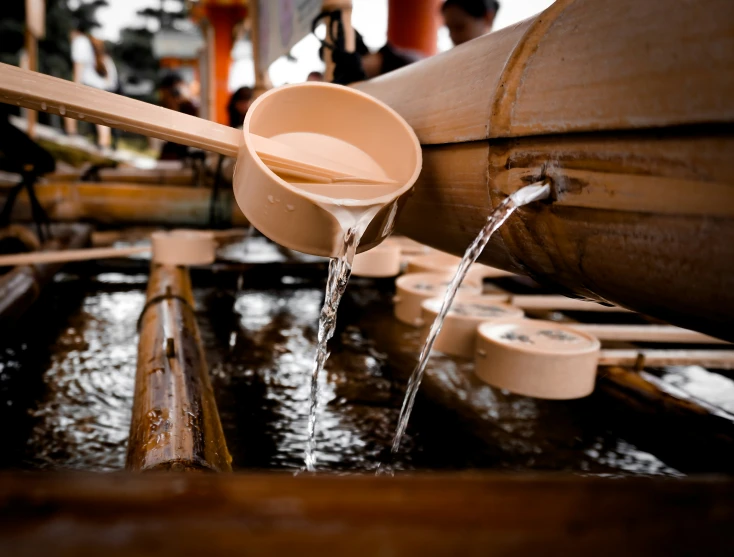 water flows from the top of a wooden object