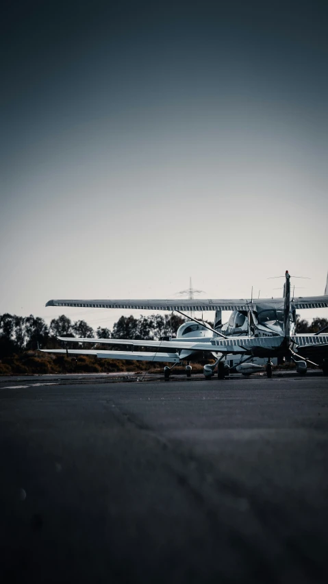 a plane parked on the tarmac at an airport