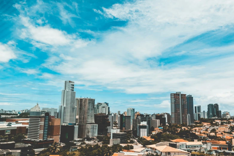 a view of a city with tall buildings