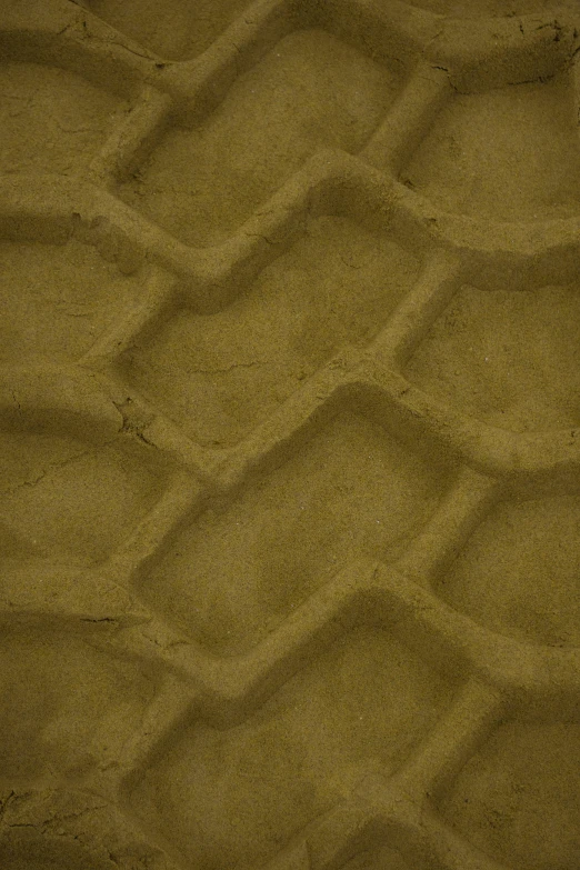 closeup of sand textured by the water