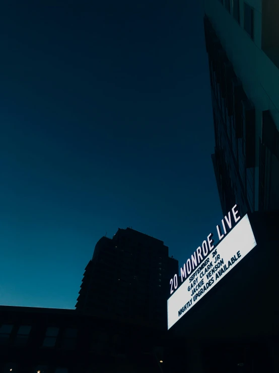 a neon sign reading the famous rock n roll casino