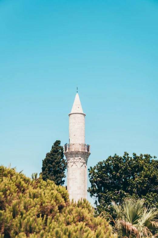 an old stone lighthouse on top of a mountain