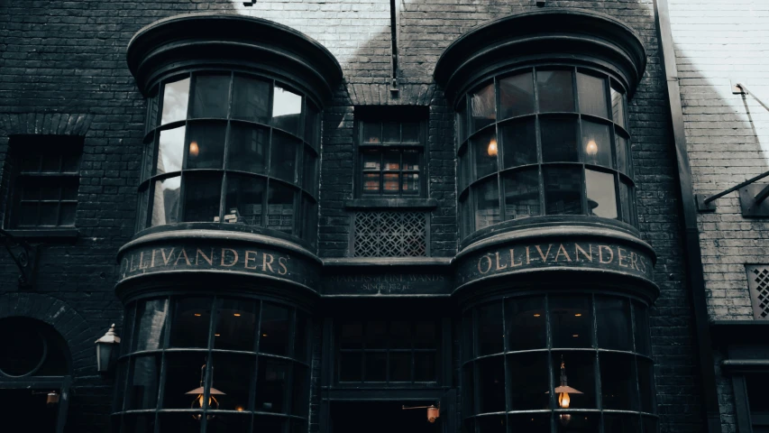 a large building with lots of windows that have the words harry potter written on them