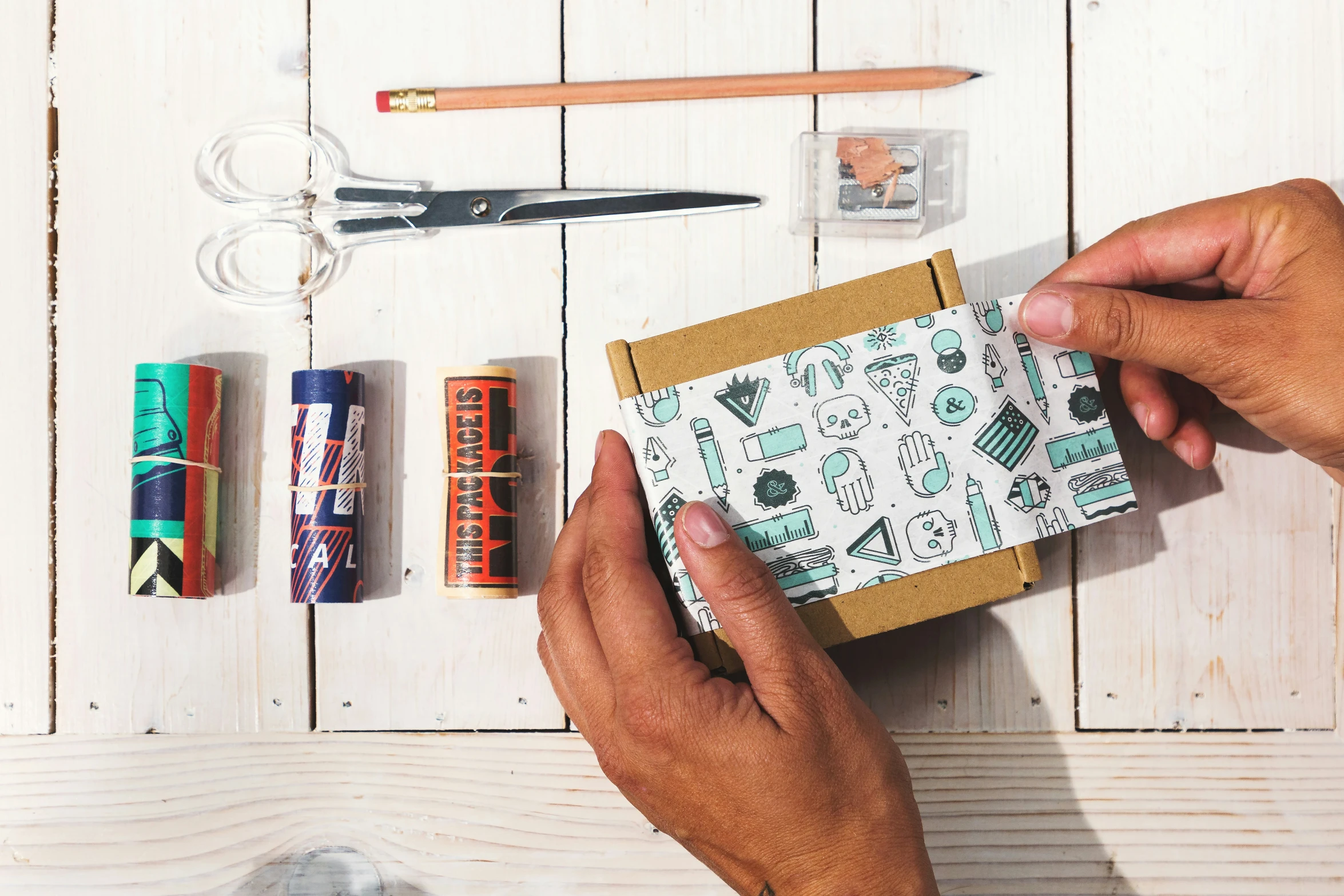 an image of someones hands holding a gift box