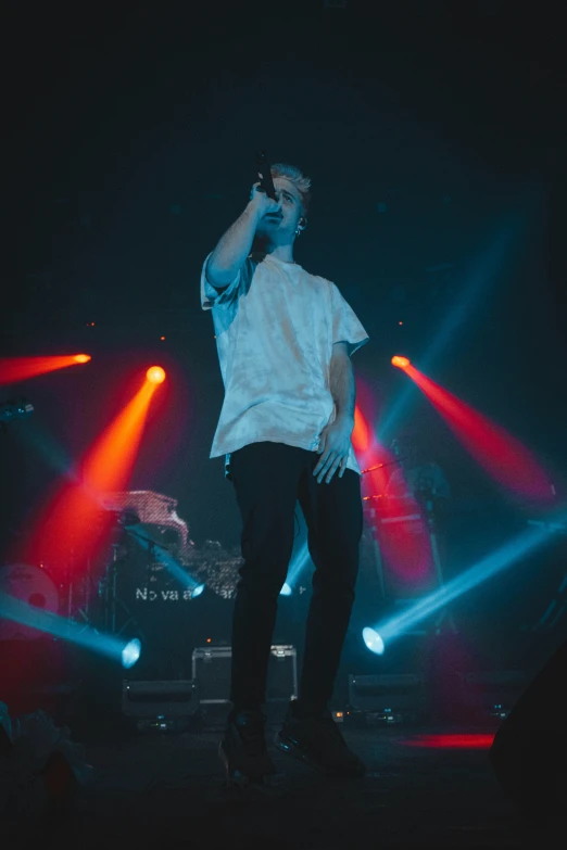 a man on stage at a concert