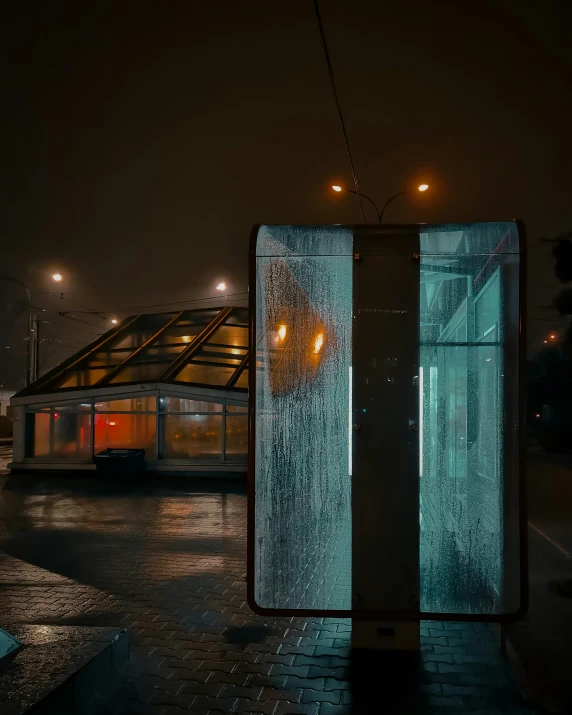 an outdoor stall with rain falling on it