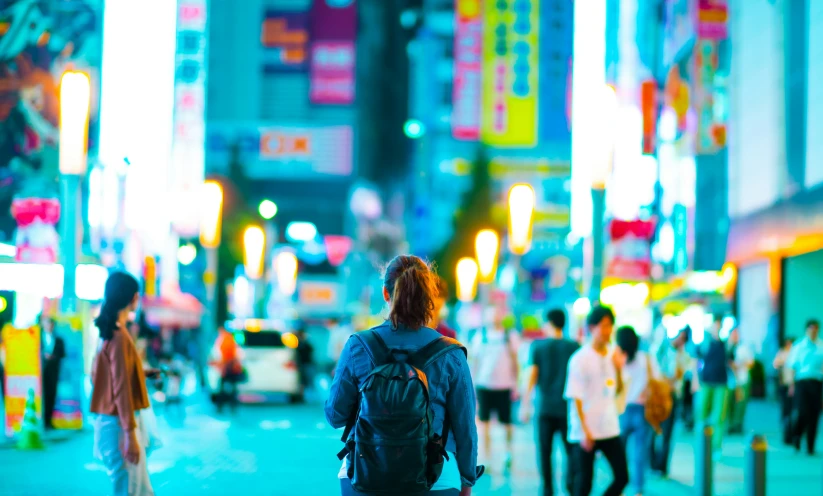 a person standing with their back to the camera