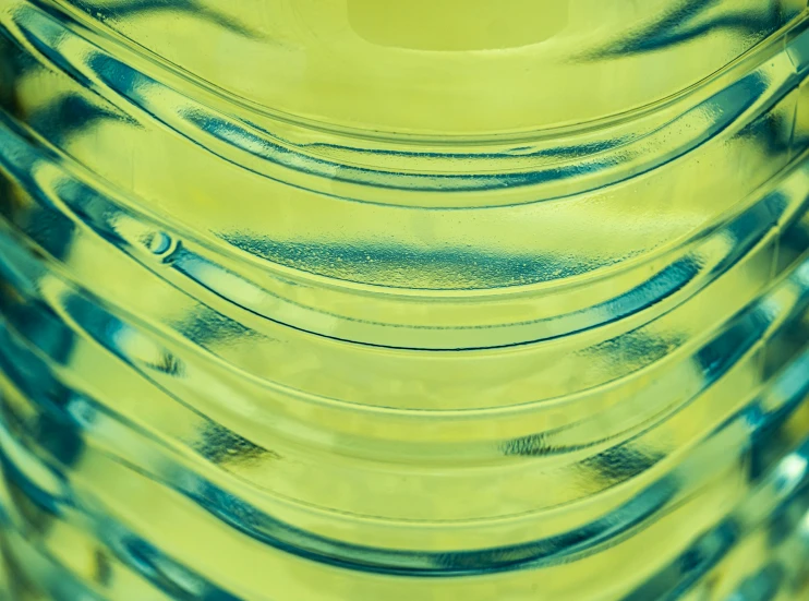 many thin shiny bowls have blue and green edges