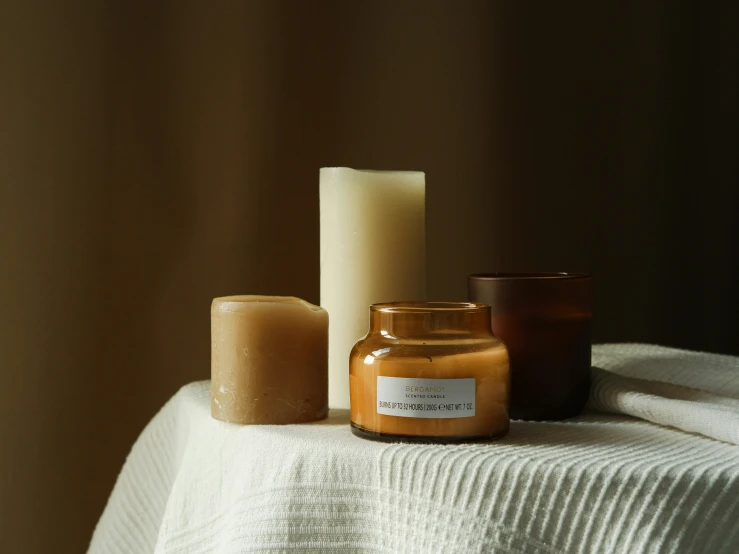 a table holding several types of candle holders