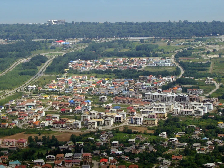 large number of houses and roads on hillside
