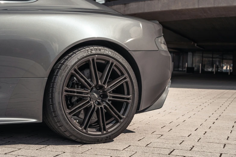 a close up of a wheel and a tire on a car