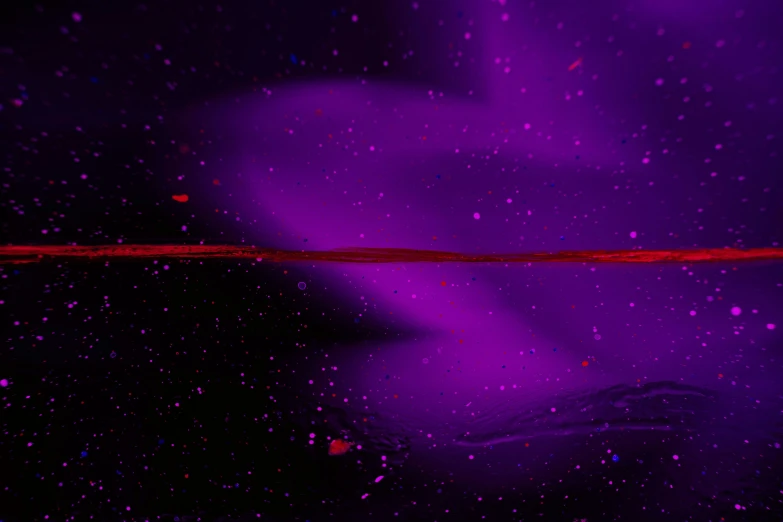 a closeup image of a dark purple sky with little bubbles