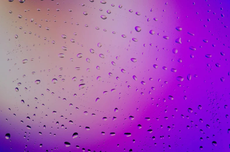 water drops are on the surface of the glass