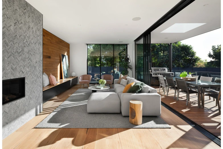 a living room filled with furniture and wooden floors