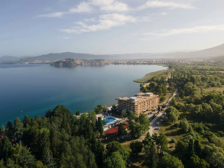 an aerial view of some sort of resort near water