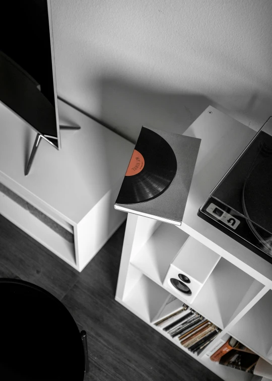 black and white picture of several discs in a room