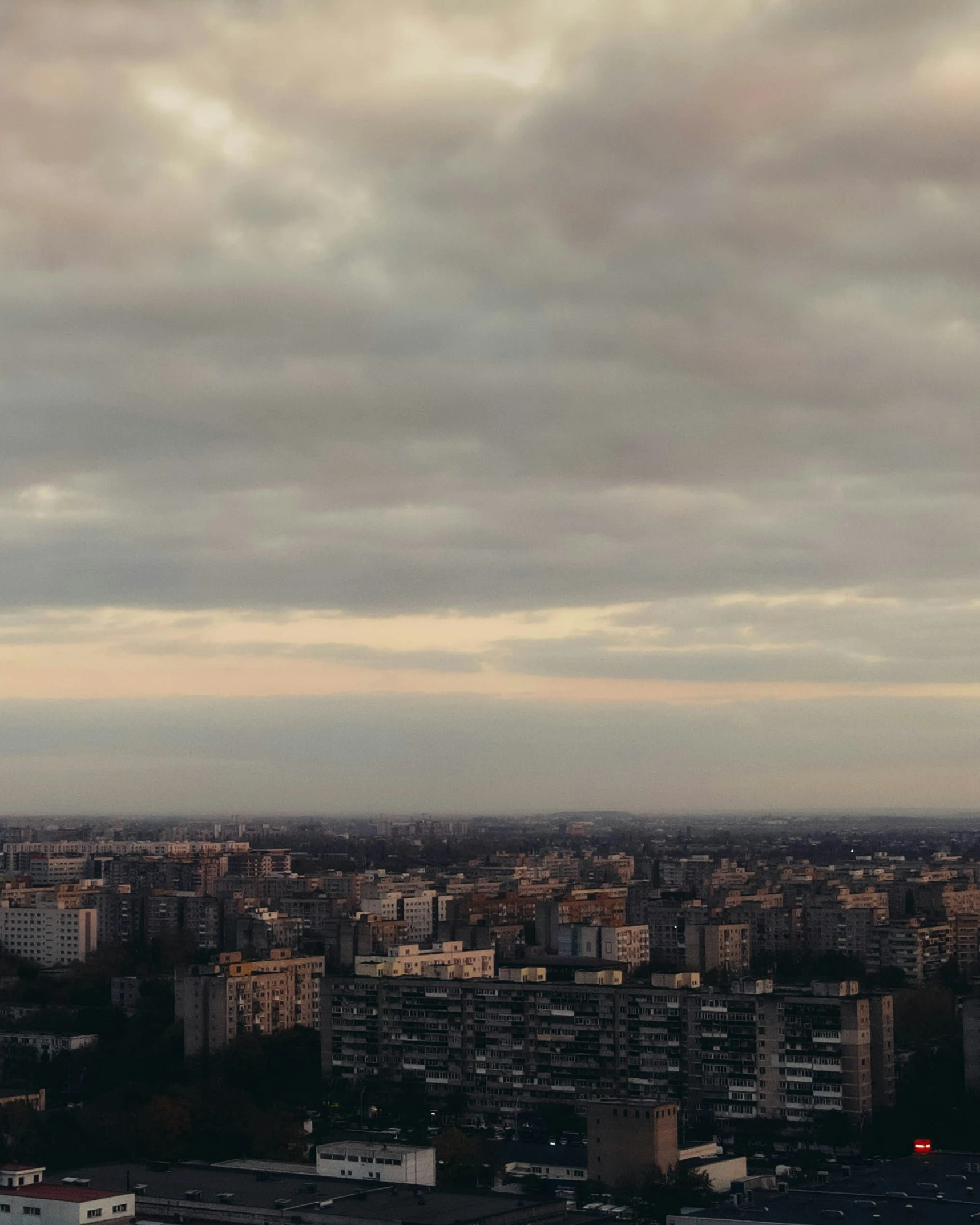 an image of a city from above with tall buildings