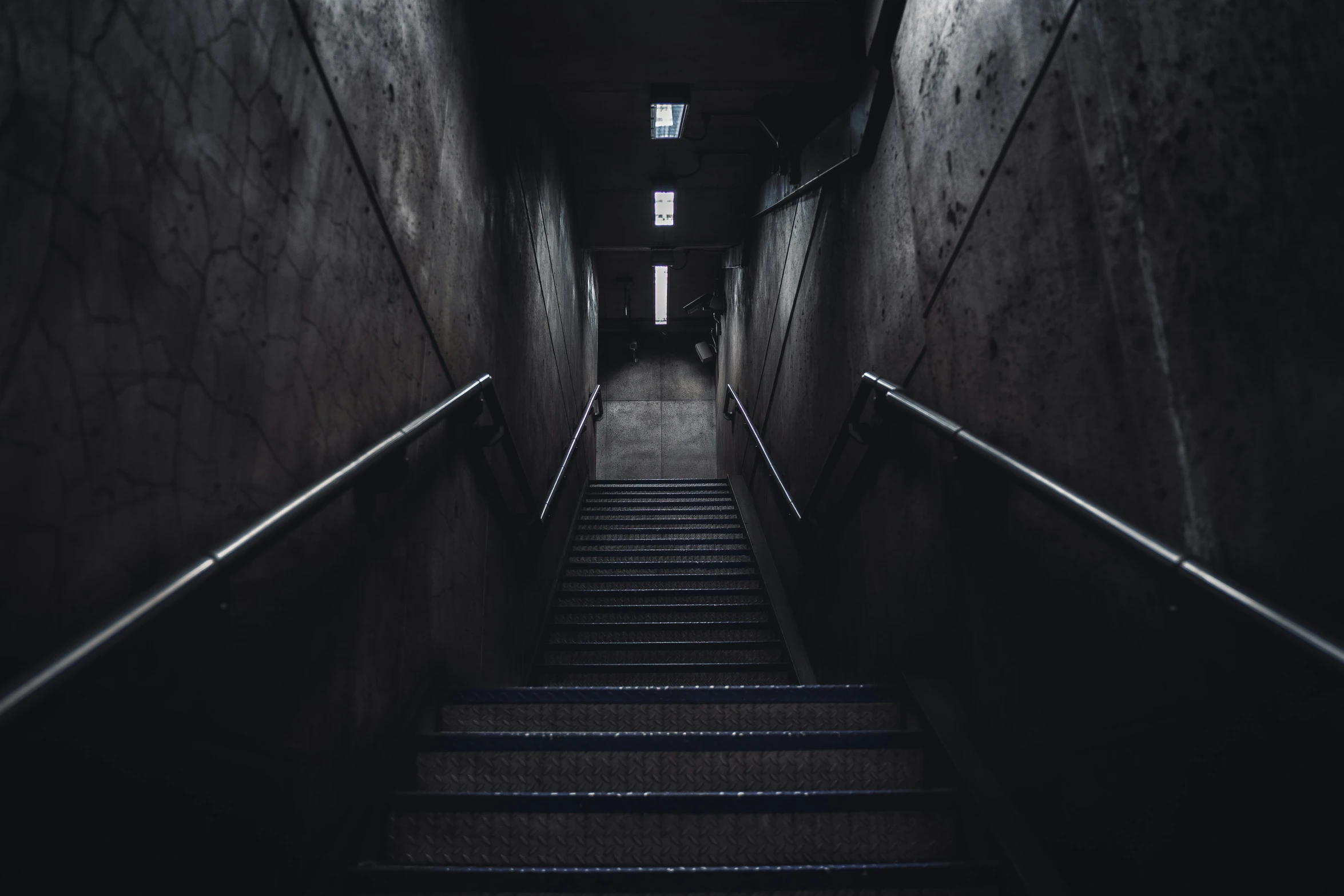 an eerie stairway leads to the second floor