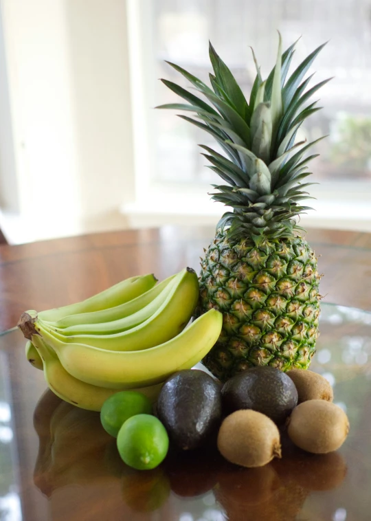 a bunch of fruit sitting on top of a wooden table