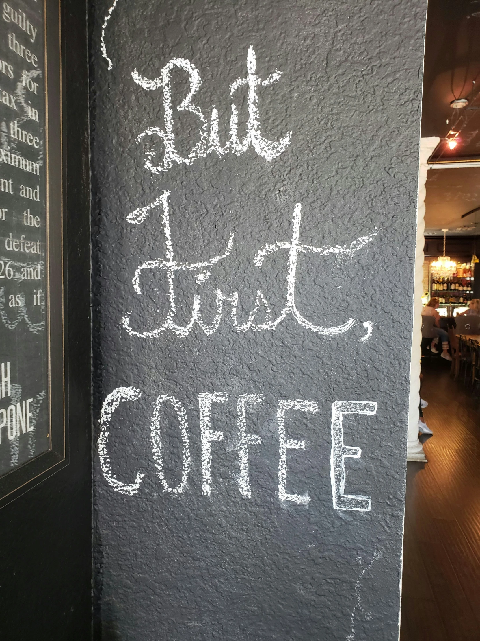 a sign is displayed in a dark room