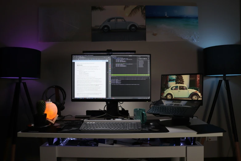 the computer monitor and keyboard are shown on a desk