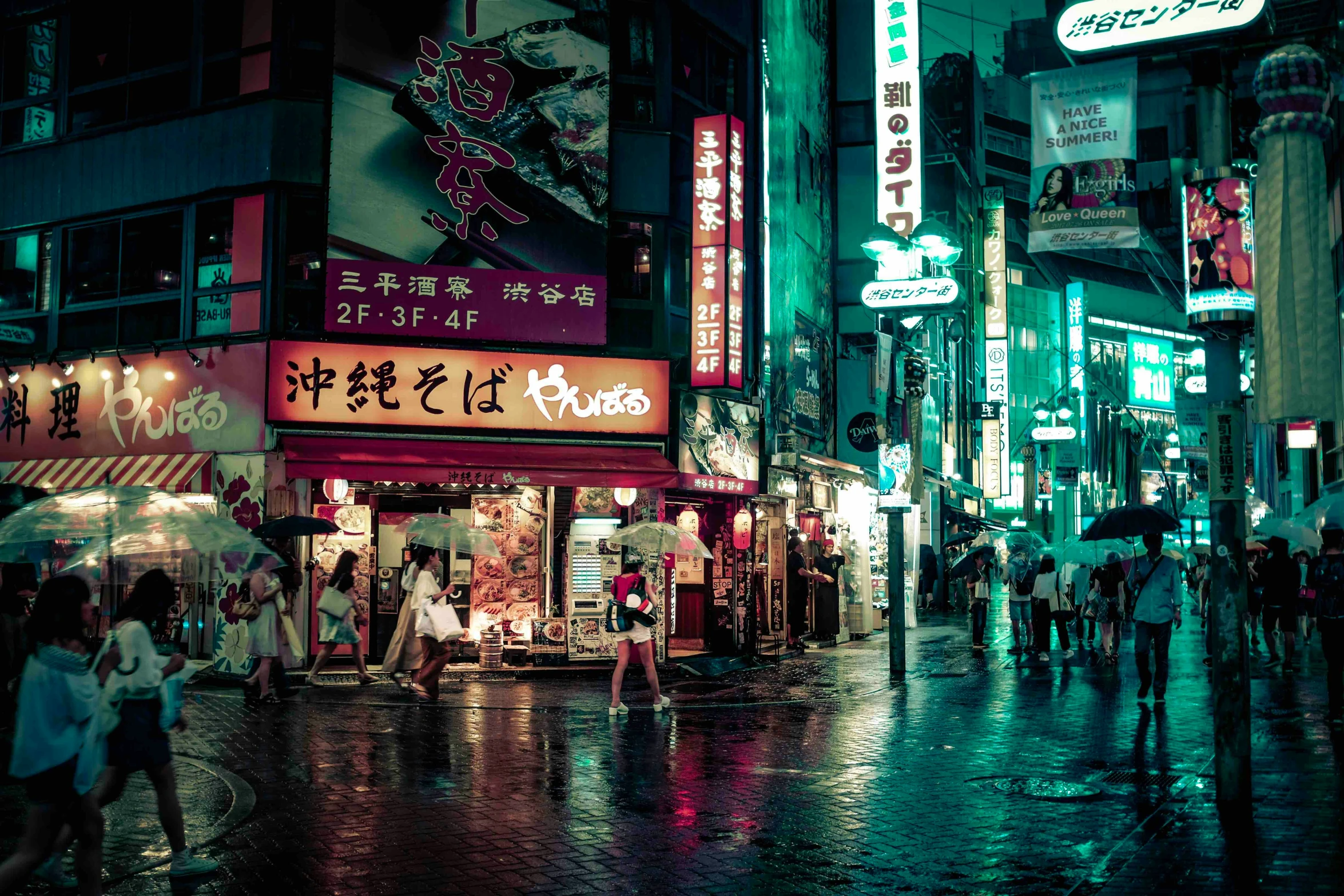 night scene in a small asian city with neon signs and lights