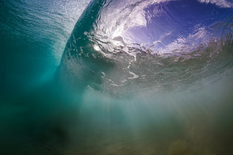 some water has small waves with the background being blue