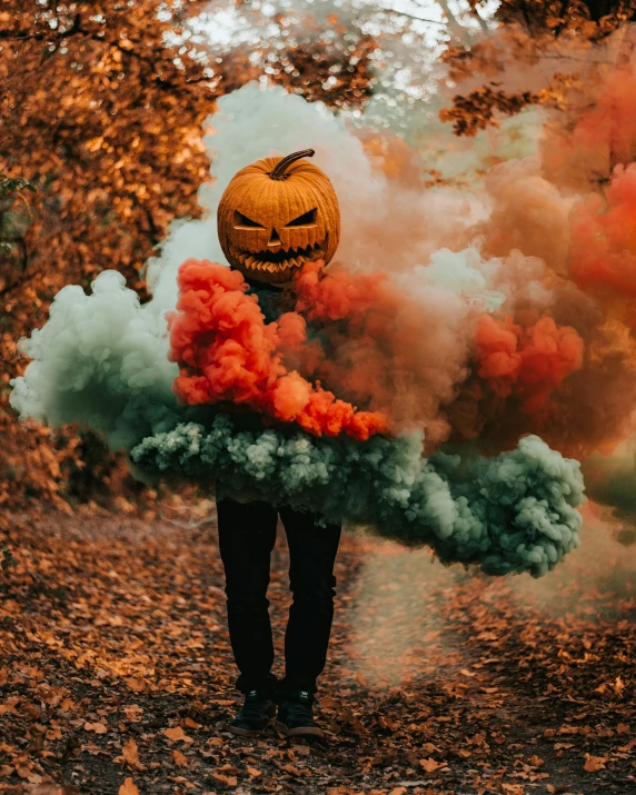 a pumpkin is surrounded by smoke and smokes