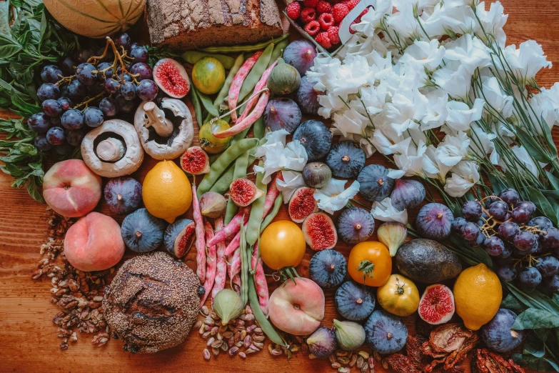 a variety of foods siting on top of a table